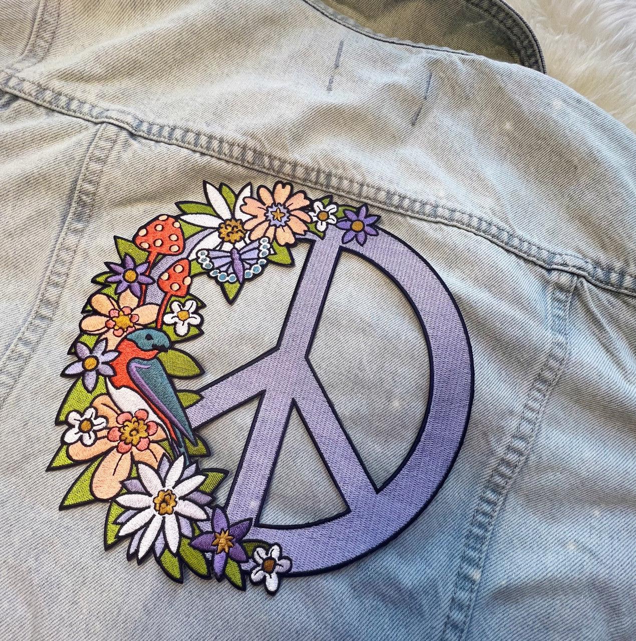 Floral Peace Sign Patch, showcasing a detailed peace symbol adorned with vibrant blossoms, symbolizing unity and nature's splendor.