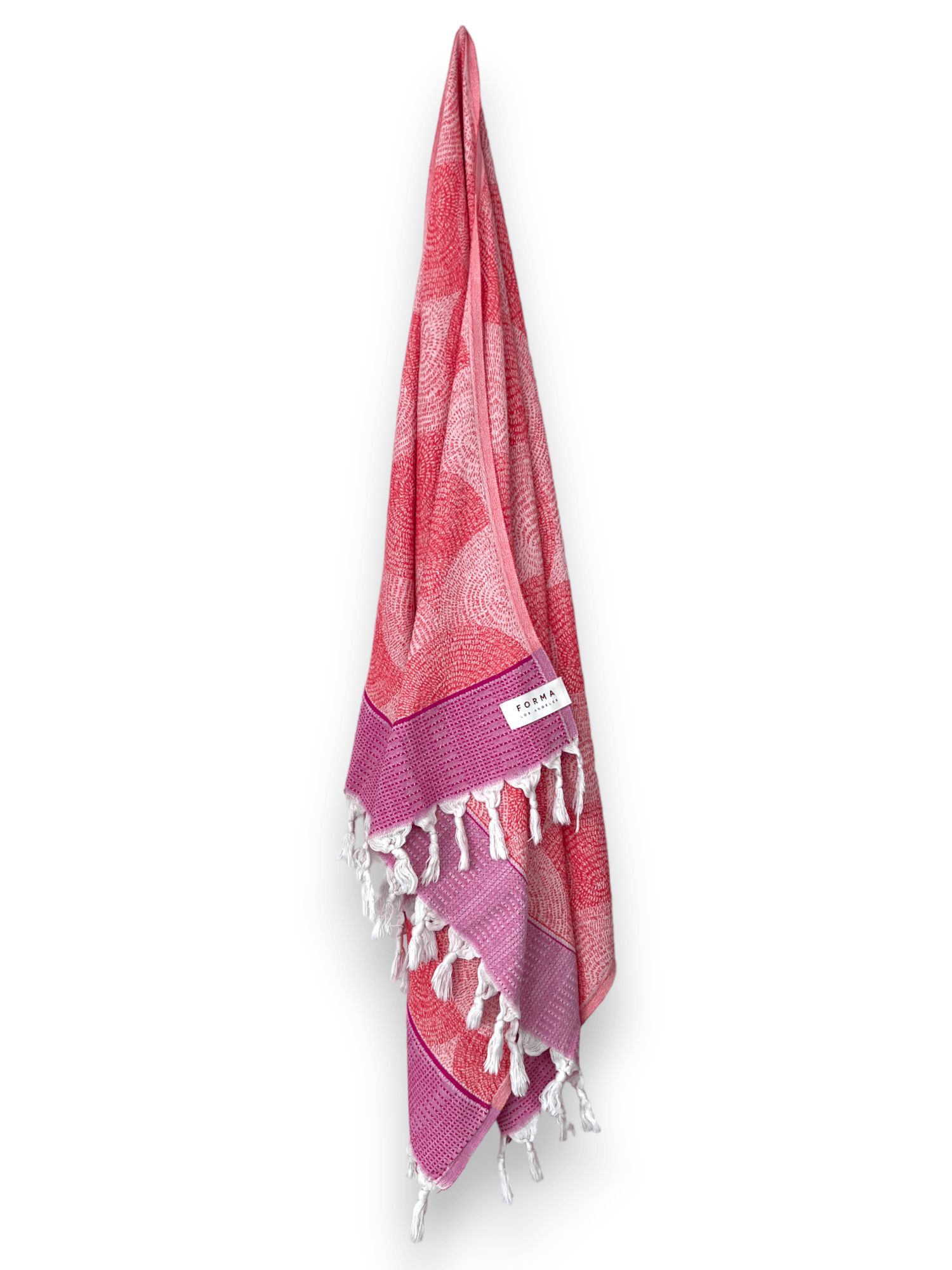A set of Forma Towels from the Shell Collection, highlighting their soft, absorbent texture, ideal for both beach and home use.