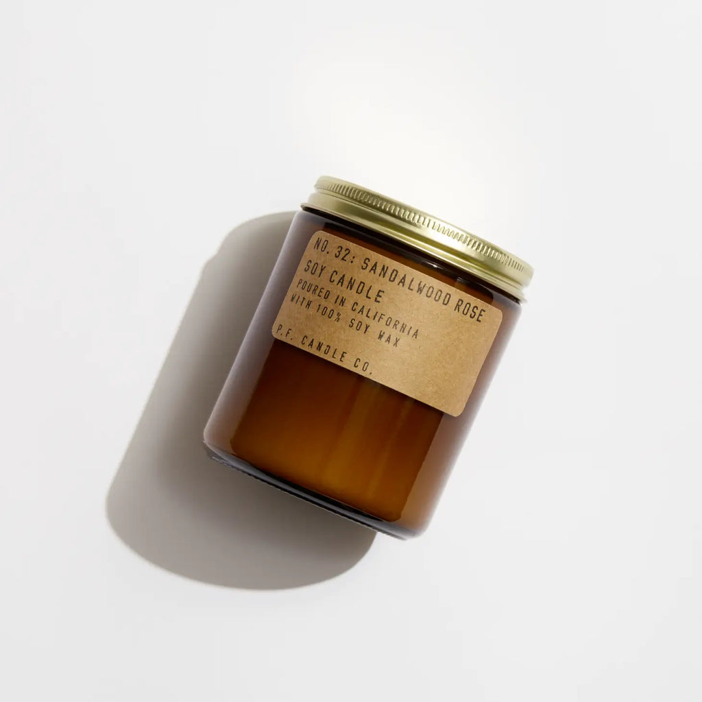 Sandalwood Rose Soy Candle in sustainable packaging, releasing a calming blend of sandalwood and rose fragrances.