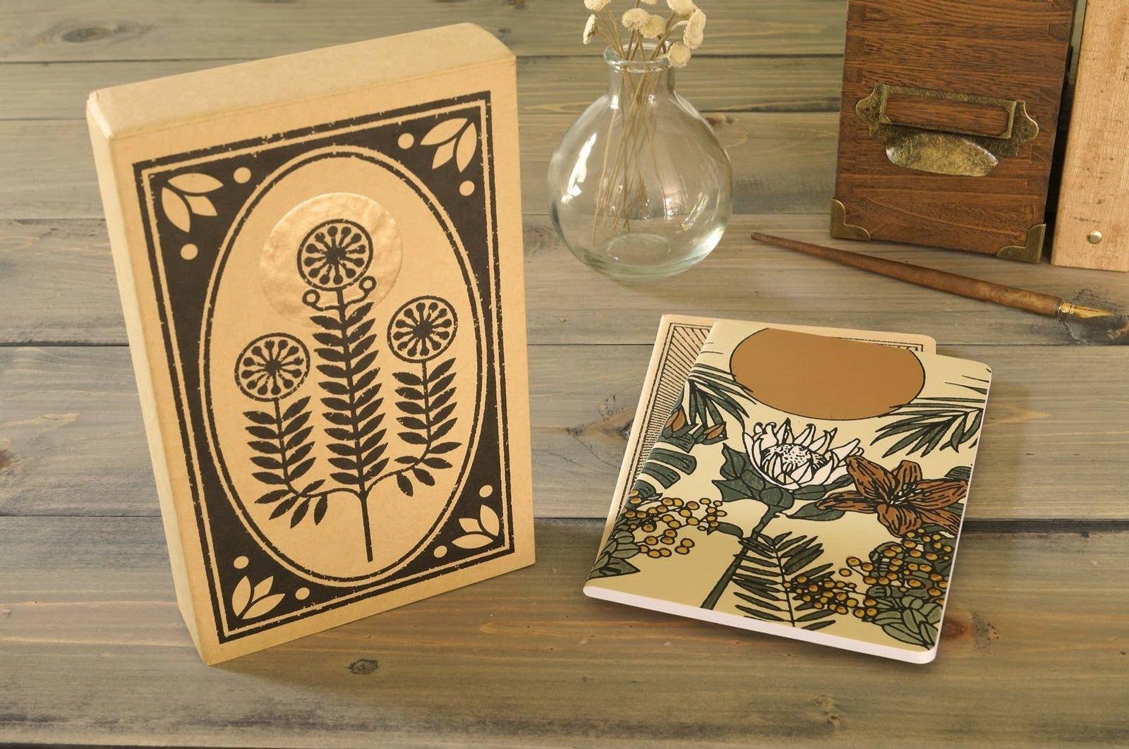 A set of five Skinny Notebooks in various colours, showcasing their slim design and portability.