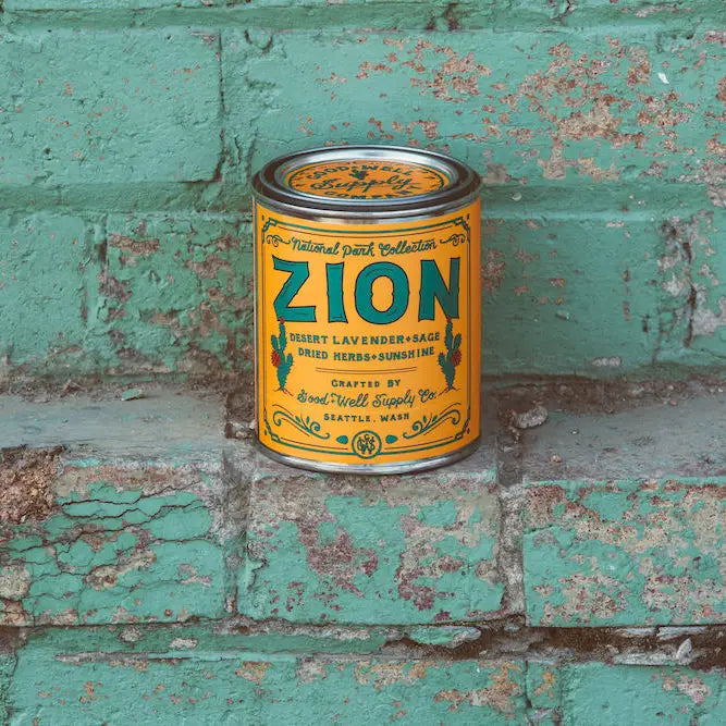 Zion Soy Candle in sustainable packaging, diffusing a striking, earthy scent reminiscent of the unique desert park.