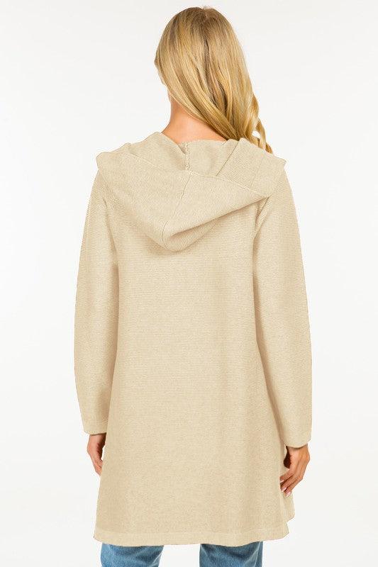 Calvin Cardigan showcasing its classic design and soft fabric, an ideal addition to any wardrobe for warmth and style.