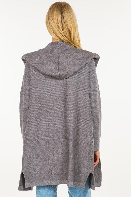 Calvin Cardigan showcasing its classic design and soft fabric, an ideal addition to any wardrobe for warmth and style.