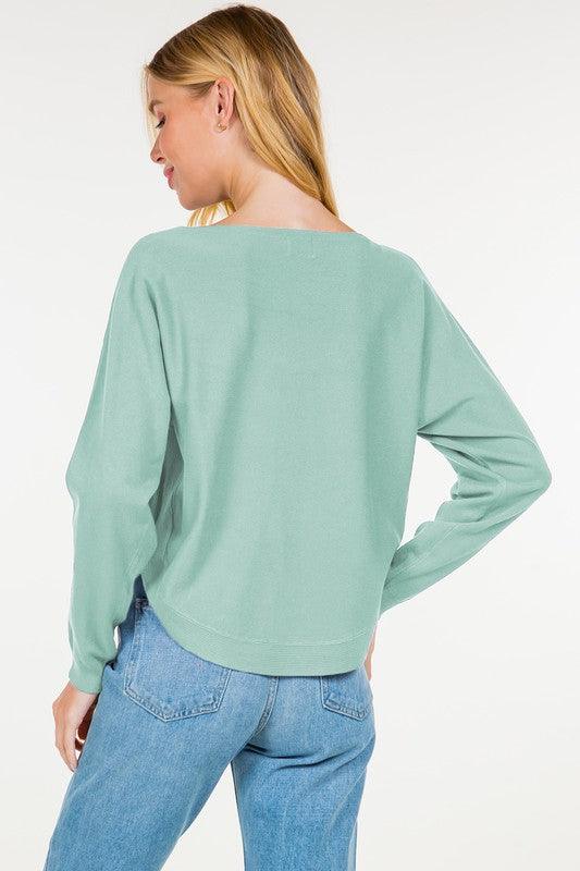Crescent Sweater, showcasing a stylish crescent moon design on a soft, comfortable fabric, ideal for cool, cozy evenings.