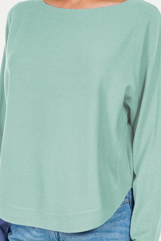 Crescent Sweater, showcasing a stylish crescent moon design on a soft, comfortable fabric, ideal for cool, cozy evenings.