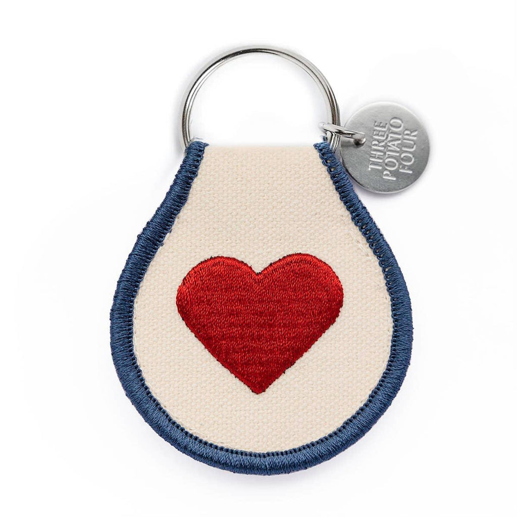 Peanuts Classic Heart Patch Keychain - A whimsical keychain featuring beloved characters in a heart design.