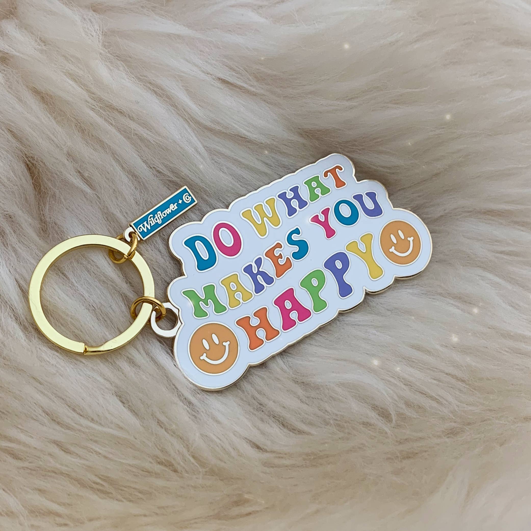 Do What Makes You Happy Keychain with a cheerful design and uplifting message.