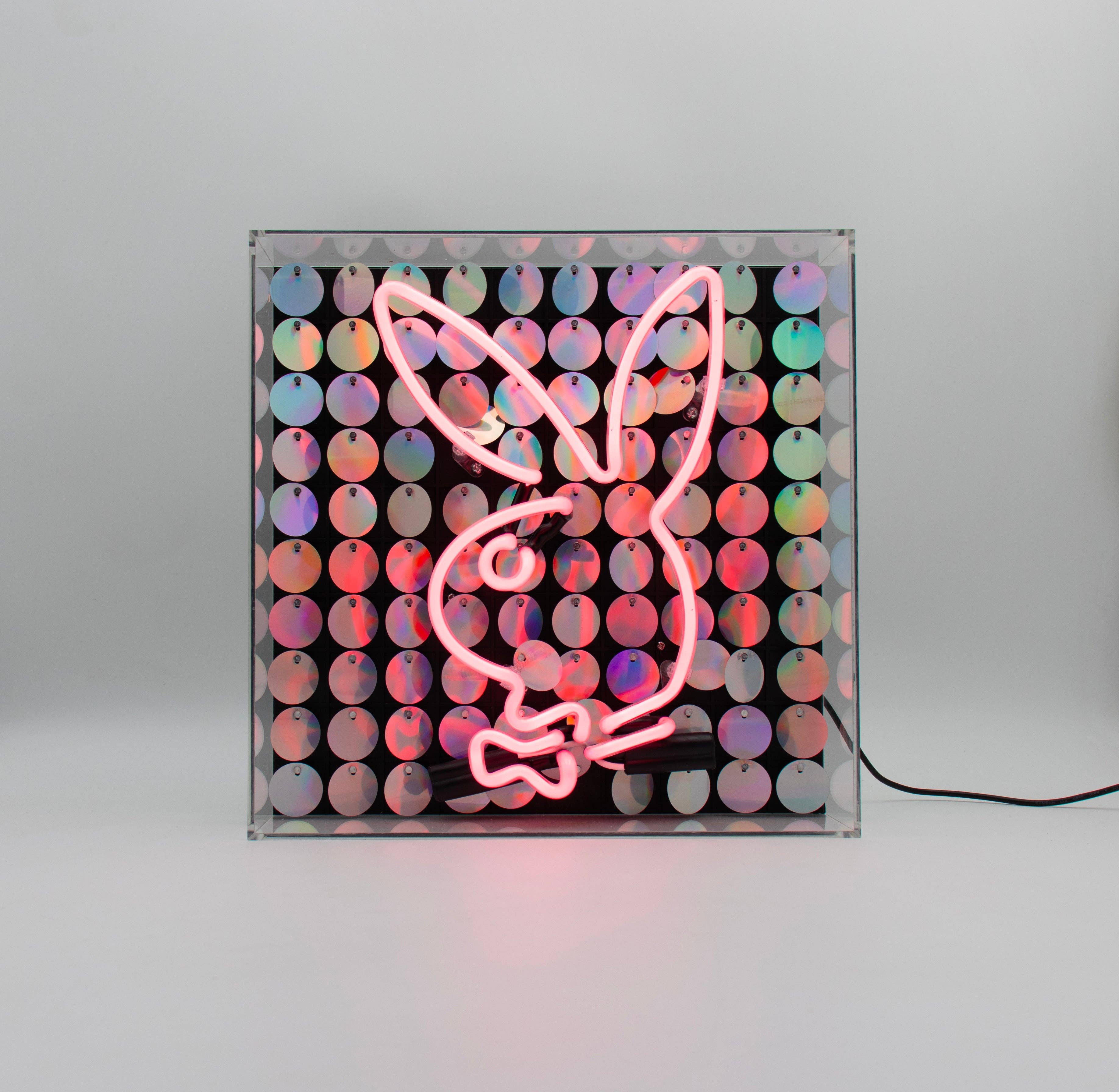 Neon Playboy Light - A vibrant symbol of iconic style and retro charm.