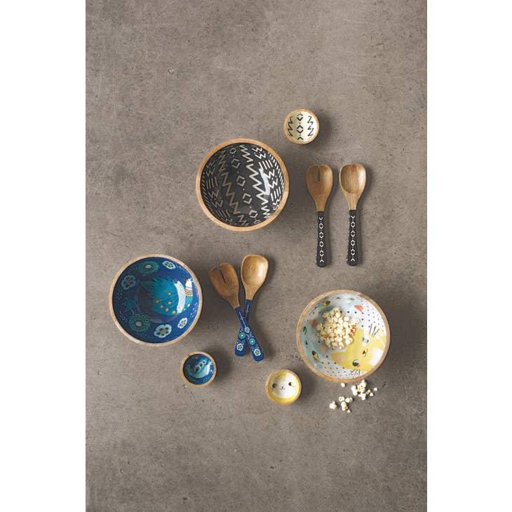 Ziggy Mango Wood Serving Utensil - Elegant serving utensils with white abstract design and mango wood handles, ideal for meal presentations.
