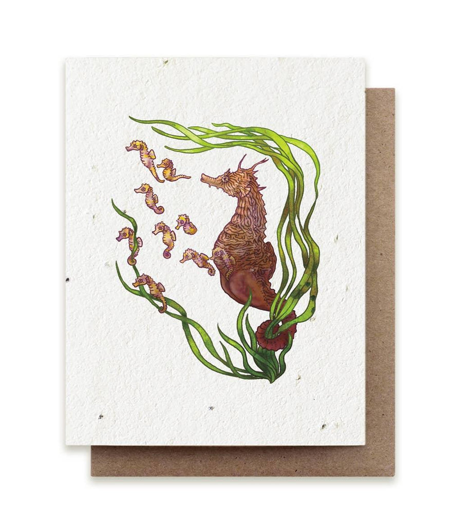 Seahorse Father card artfully illustrated, embedded with herb seeds, signifying the beauty of fatherhood and nature intertwined.
