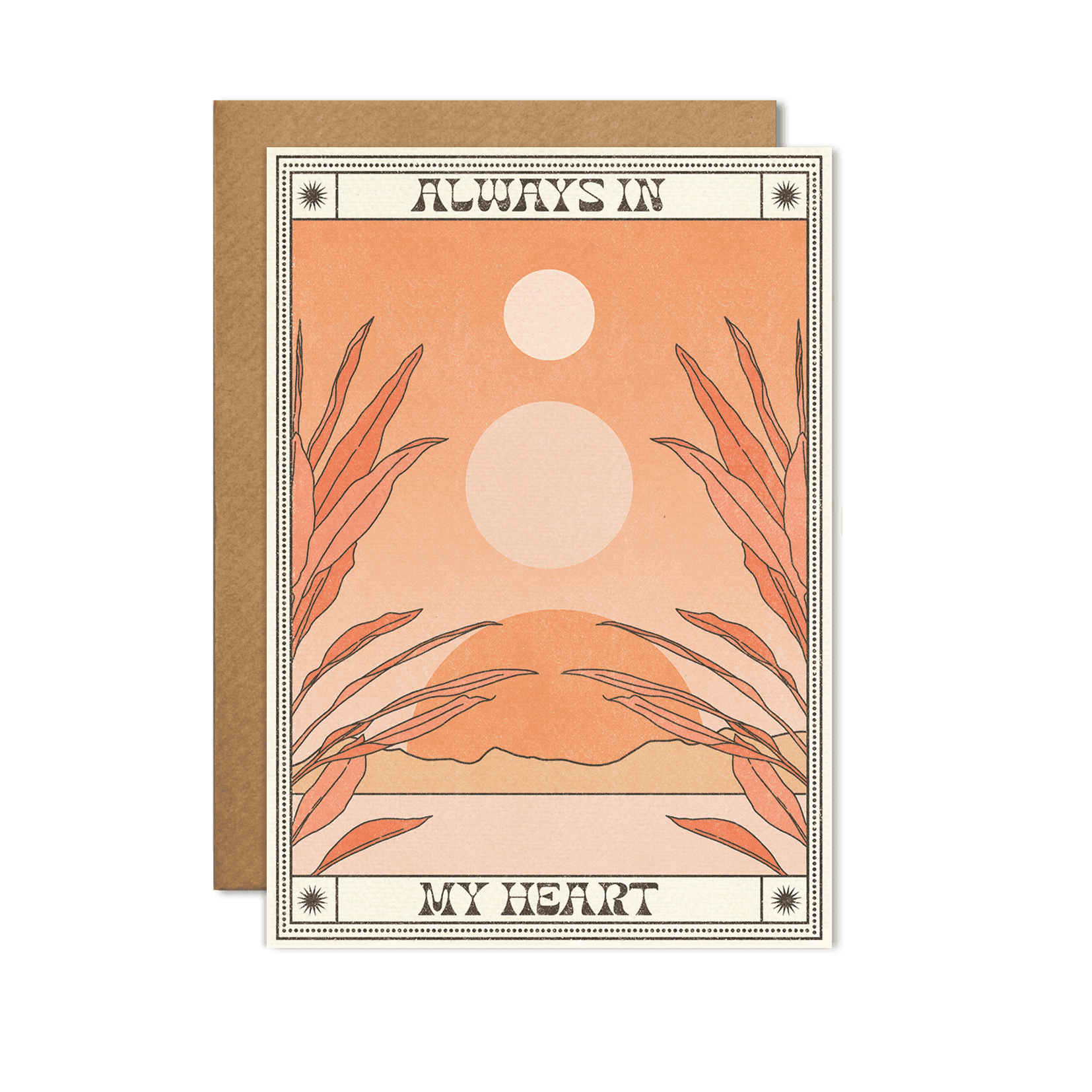 Close-up image of an "Always In My Heart" Card with elegant design elements, placed on a warm wooden background.