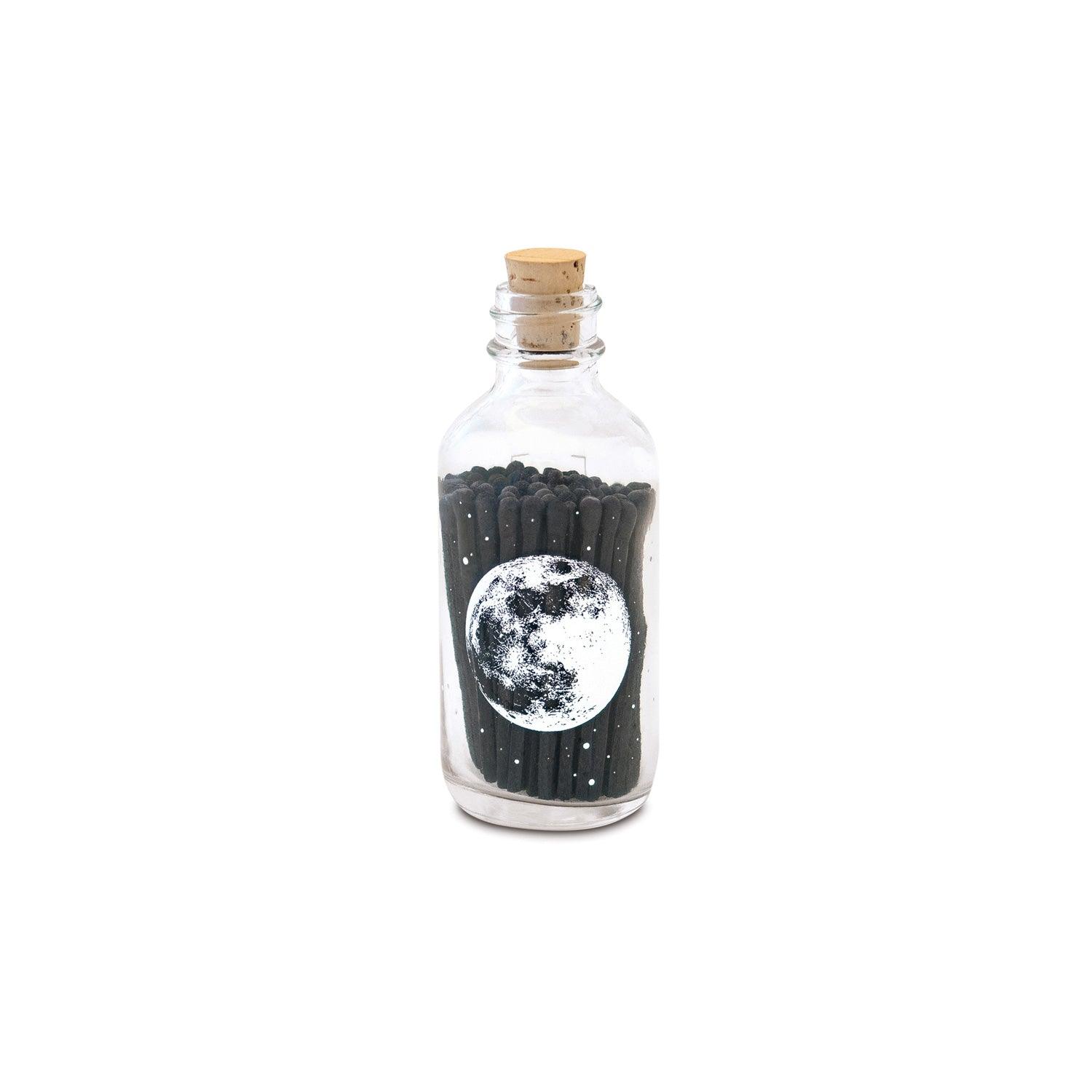 Small Moon Matches in a compact matchbox, featuring a whimsical moon design, ideal for lighting candles and creating a cozy ambiance.