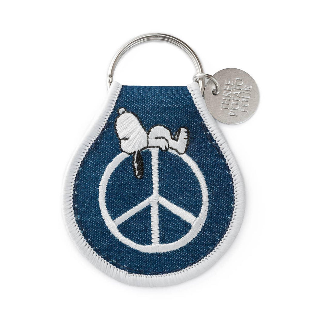 Peanuts Snoopy Peace Patch Keychain - Snoopy promoting peace. A stylish and meaningful accessory for keys or bags.