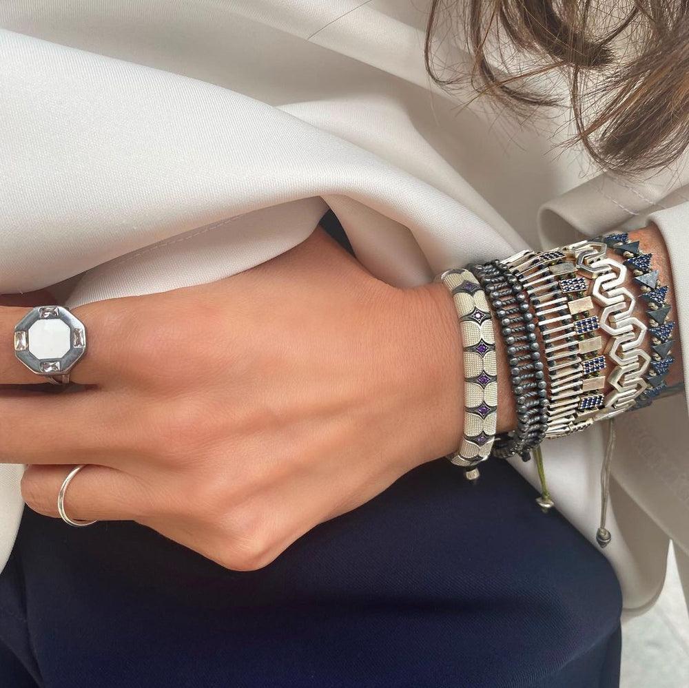 Roof Bracelet: A modern masterpiece inspired by architectural elegance.