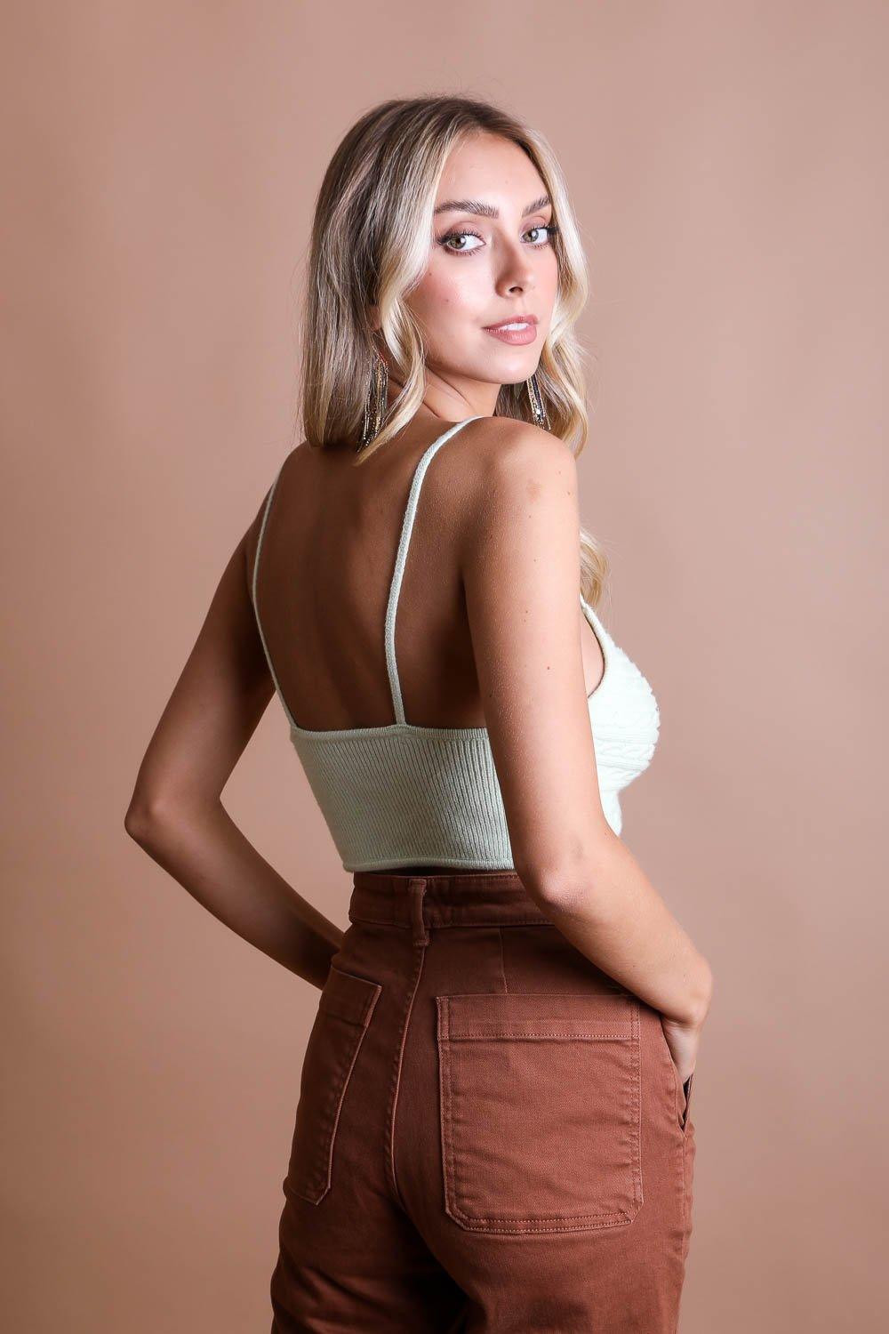 Woman in Forma's Knit Pattern Brami, demonstrating its detailed pattern and superior fit.