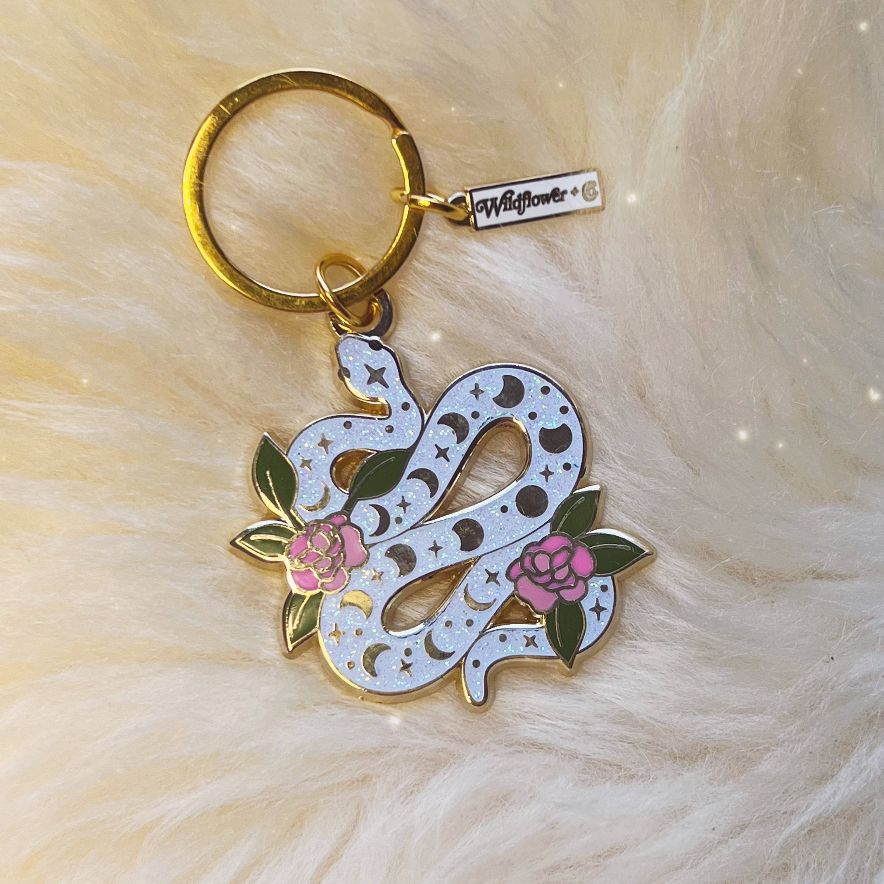 Serpent Enamel Keychain - Captivating accessory featuring a serpent design in vibrant enamel.