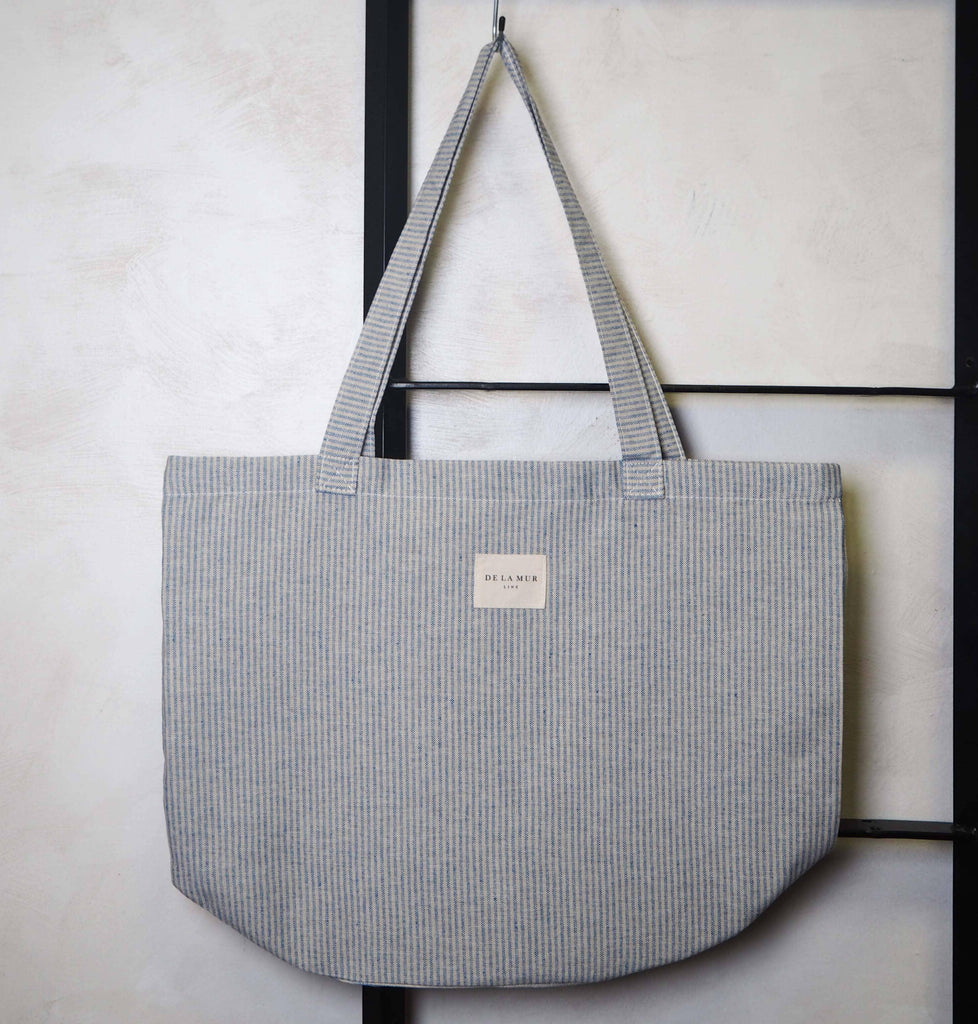 Yal Tote Large constructed from durable materials, featuring a distinctive design with ample room