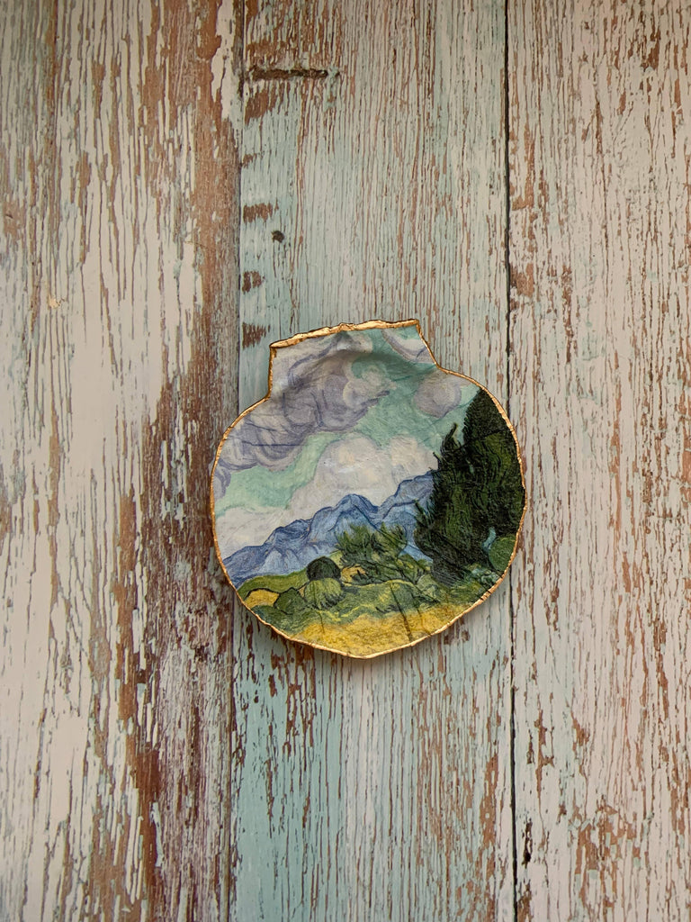 A Painted Garden Shell, hand-painted with an intricate and colorful garden scene, showcasing the beauty of nature in art form.