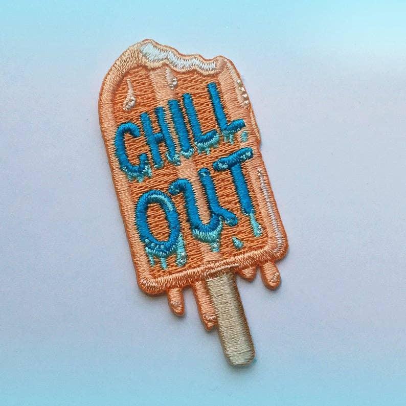 Colorful embroidered popsicle patch with "Chill Out" text.