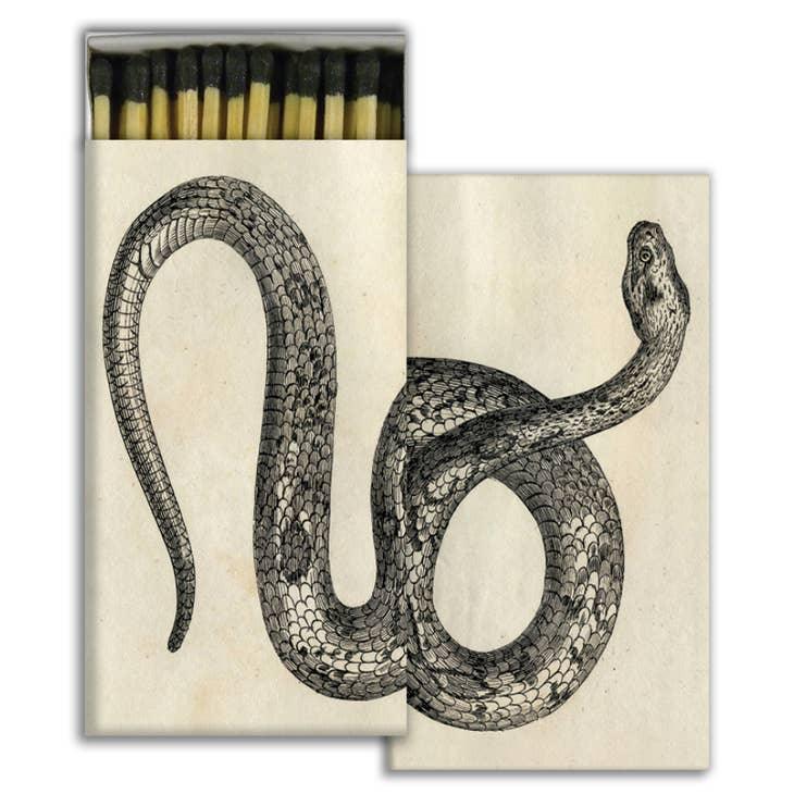 Snake Matches in a captivating matchbox, featuring a striking snake design, ideal for lighting candles and fires.