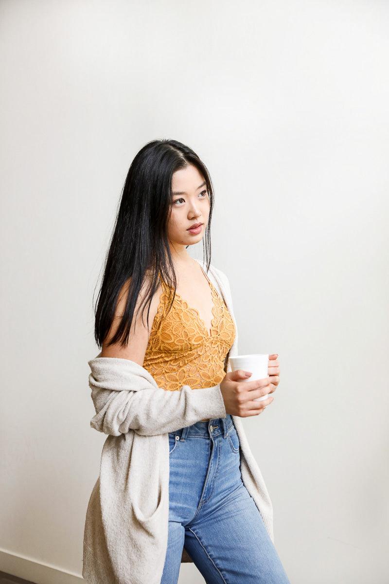 Forma's Daisy Lace Bralette, featuring a charming daisy lace design for a touch of whimsy and comfort.
