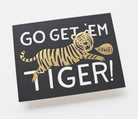 "Go Get 'Em Tiger" greeting card with a leaping illustrated tiger and bold typography, paired with a white envelope.