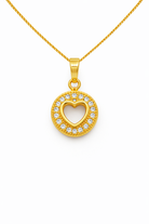 Gold necklace with a heart-shaped pendant on a white background