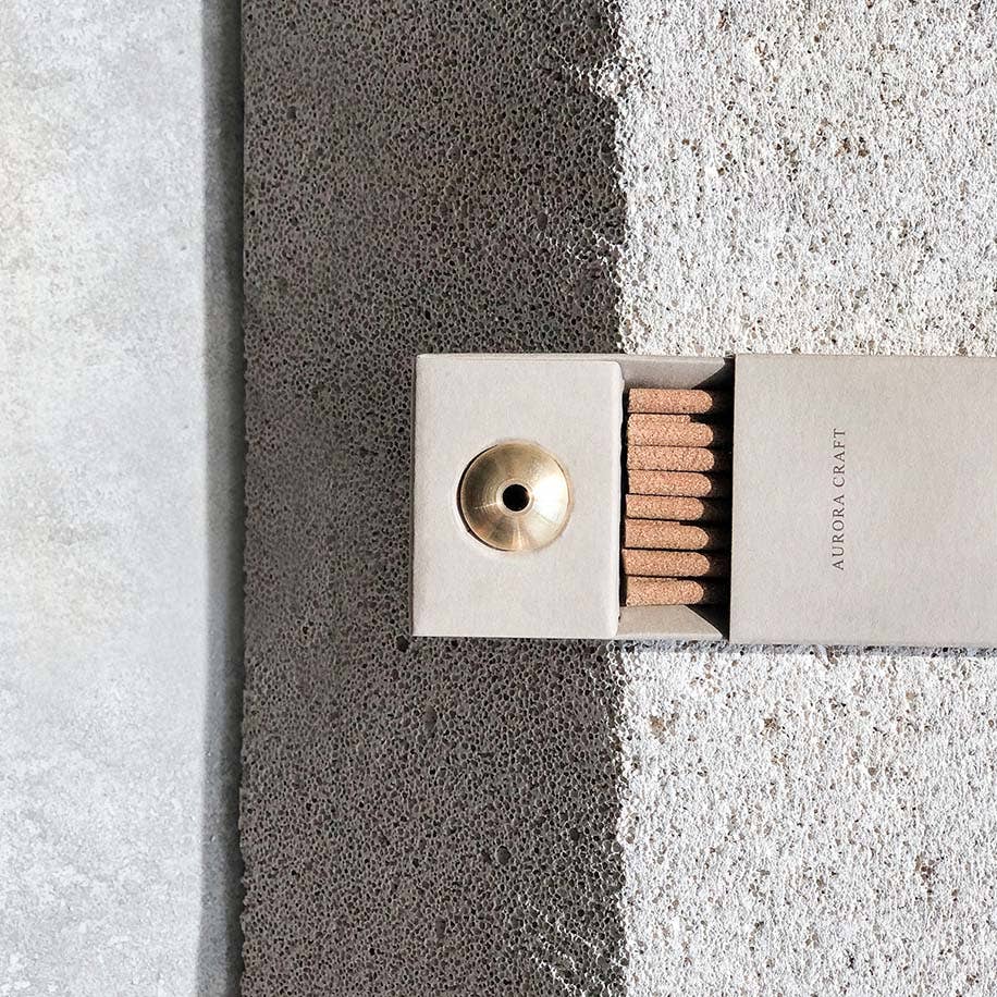 Shaman natural incense sticks in a taupe box with an embossed tribal symbol and built-in holder for grounding and spiritual balance.