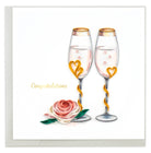 Two champagne glasses with heart designs and a rose on a white background, with 'Congratulations' text.