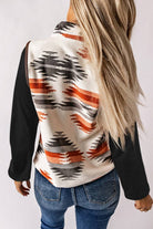 Model wearing an Aztec Western Fleece Vest Jacket with a bold pattern, snap-button front, and zippered pockets.