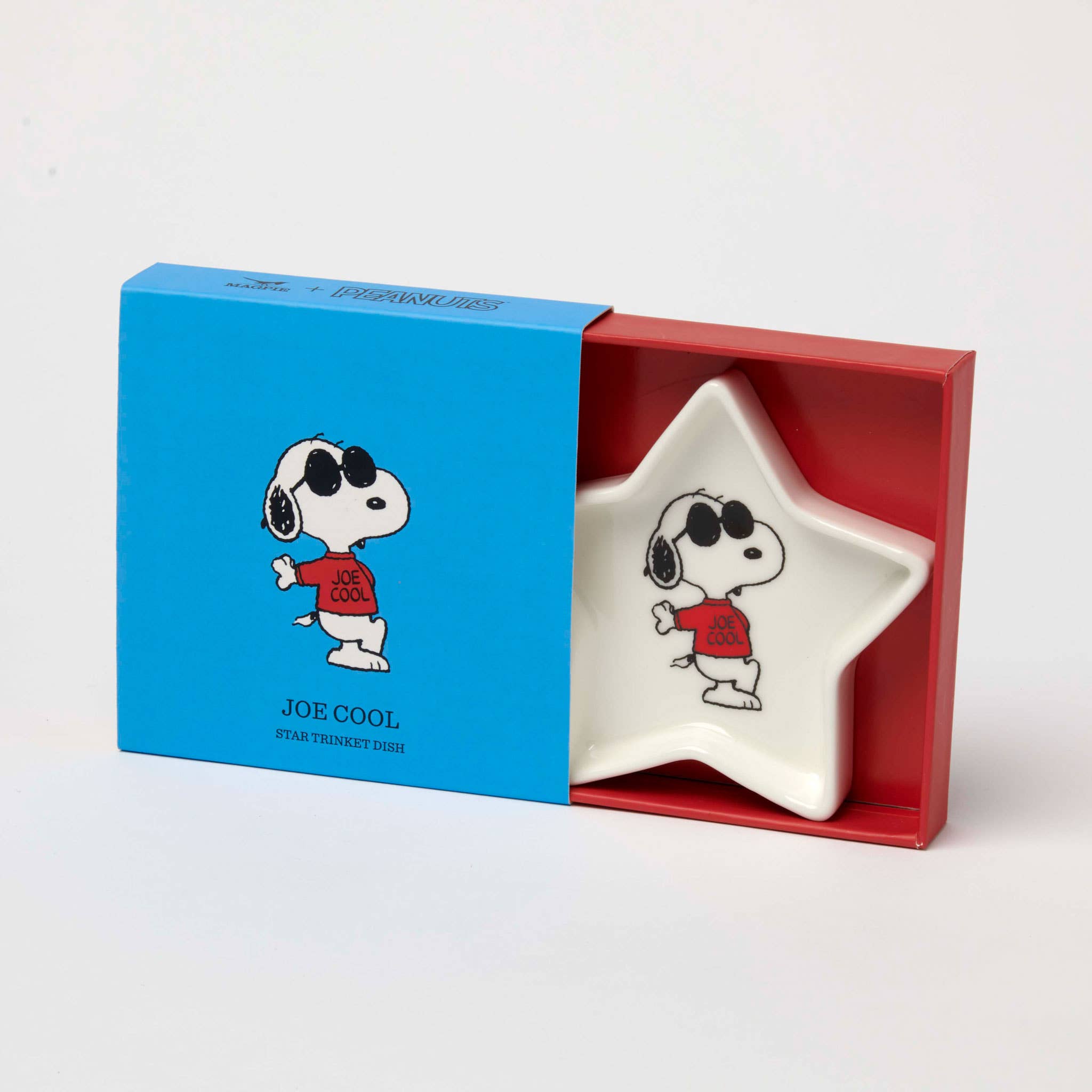 Star-shaped ceramic trinket dish featuring a black-and-white beagle wearing sunglasses and a red "Joe Cool" shirt, packaged in a blue and red gift box.