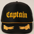 Black cap with 'Captain' in yellow text and gold accents on a light gray background