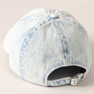 Light-wash denim baseball cap with embroidered American flag patch, ideal for 4th of July.