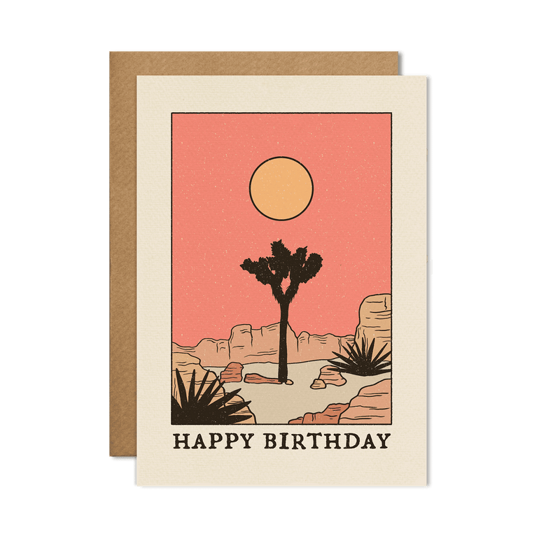 Happy Birthday card featuring a desert scene with a Joshua tree and a warm sunset.