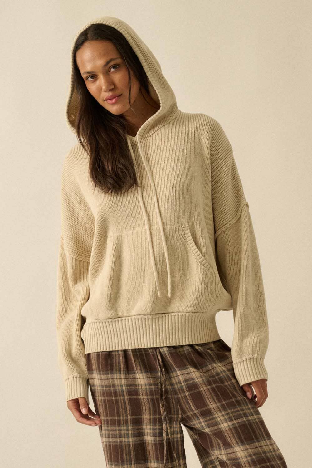 White long-sleeve ruched fitted top on model
