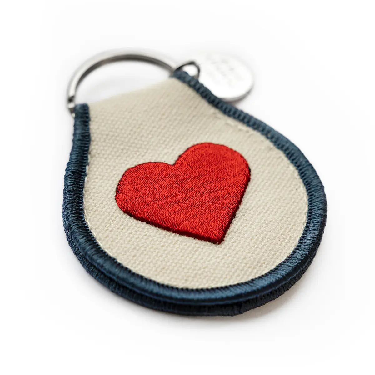 Peanuts Classic Heart Patch Keychain - A whimsical keychain featuring beloved characters in a heart design.