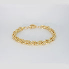 Lily Bracelet: Delicate gold chain bracelet with colorful gemstones.