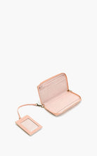 Beaded wallet and card holder set with colorful geometric and floral patterns in earthy and pastel tones.