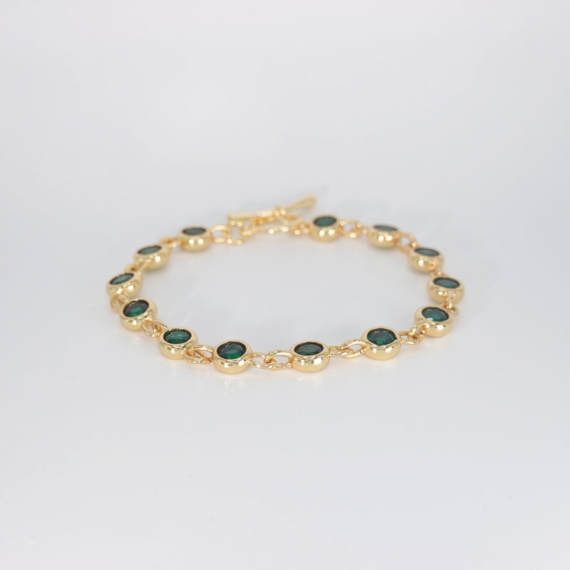 Begonia Bracelet: Adorned with lush green stones, epitome of natural beauty and freshness.