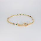  Lotus Bracelet: Shimmering stones encircling a serene green centerpiece, epitome of elegance and tranquility.