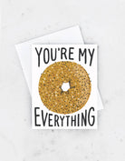 Card with a donut illustration and text 'You're my everything' on a white background