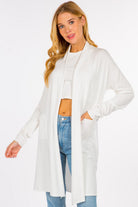Isabel Cardigan showcasing its luxurious fabric blend and stylish design, a perfect layering piece for any outfit.