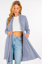 Isabel Cardigan showcasing its luxurious fabric blend and stylish design, a perfect layering piece for any outfit.
