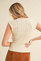 A high-neck tank top named "Hazel".
