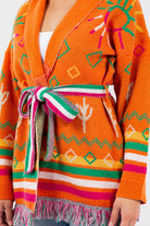 Maya Cardigan - A sophisticated knit with a flattering silhouette and delicate details for timeless elegance.