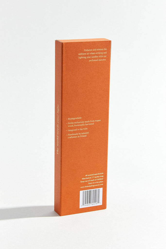 Orange product packaging with text on a white background