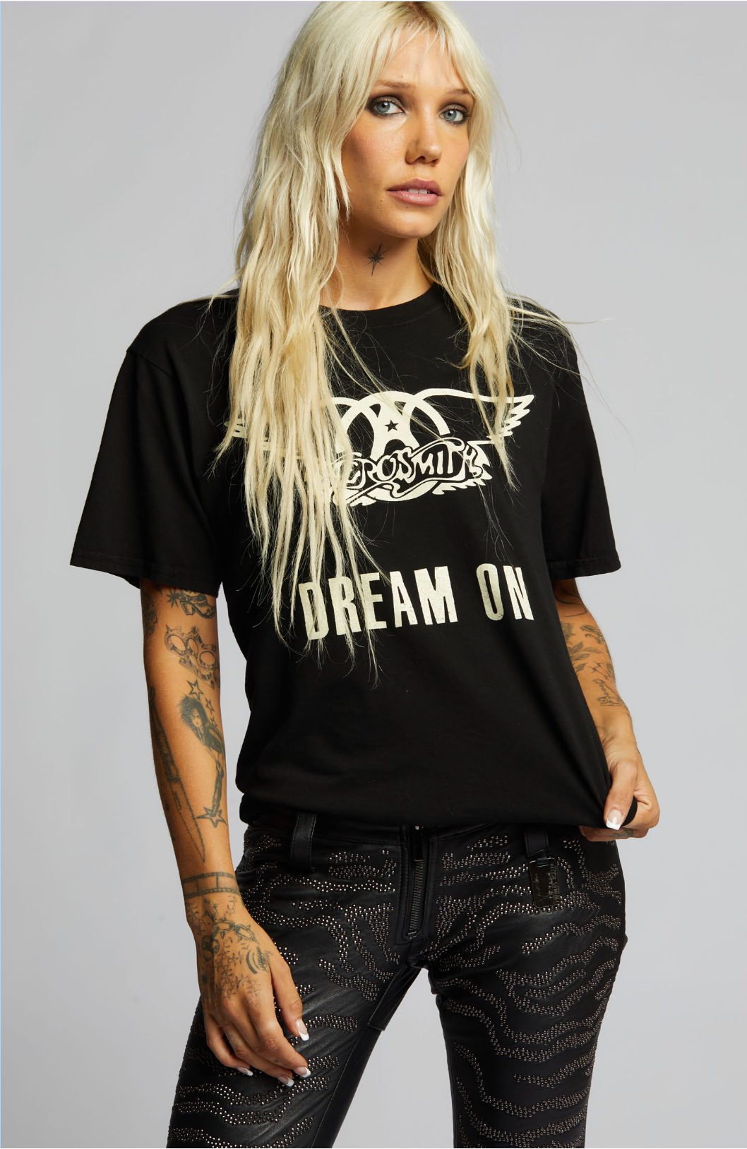 Aerosmith "Dream On" black graphic t-shirt with a relaxed fit, featuring the iconic band logo and bold vintage-style lettering.
