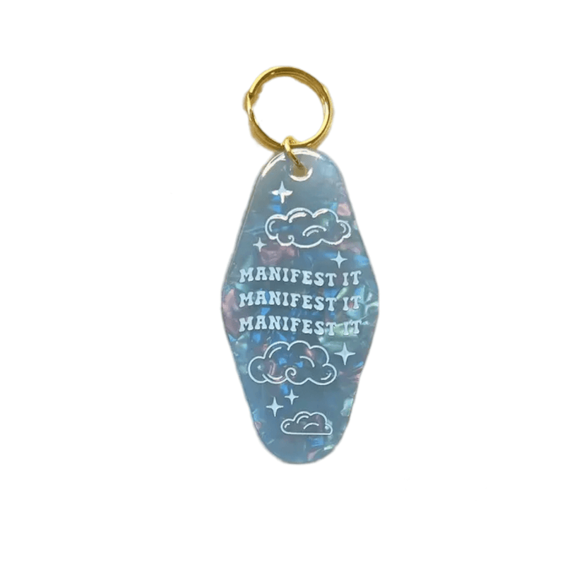 Cute Motel Keychain with vibrant design and an inspiring positive quote, adding a touch of retro and cheer to daily life.