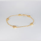 Rosebud Bracelet: Delicate heart-shaped motifs adorned with shimmering stones, epitome of romantic allure.