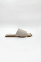 Lenny Sandals displayed in both suede and leather options, showcasing their luxurious materials and classic design.